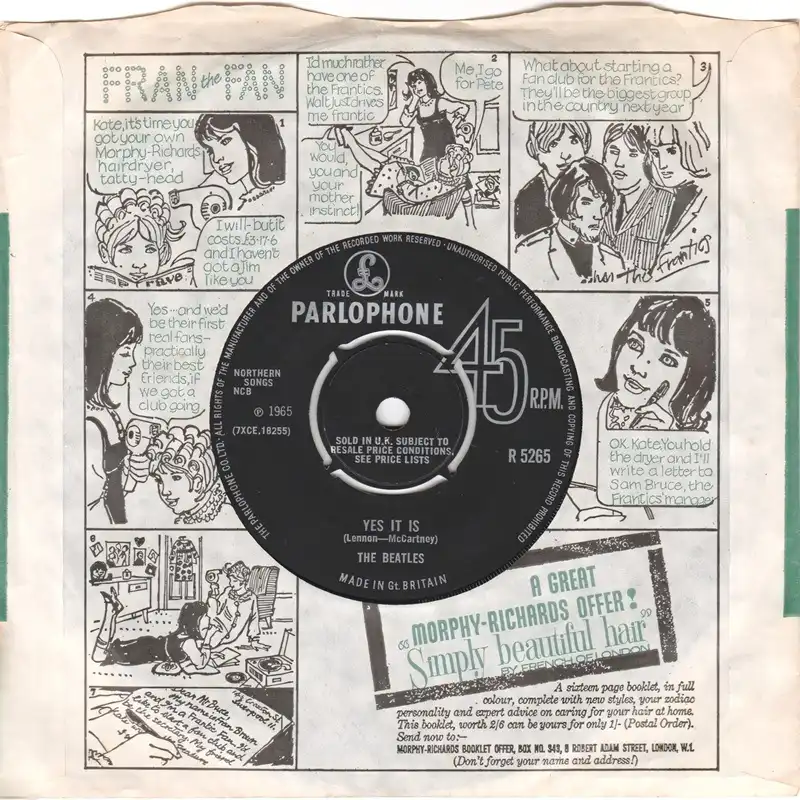 Original UK Parlophone 45rpm single for "Yes It Is" by The Beatles shown in a comic-strip promotional sleeve
