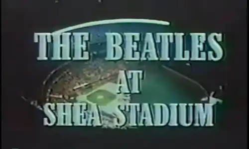 The Beatles at Shea Stadium (1966) television special title screen showing an aerial view of the packed Shea Stadium crowd.